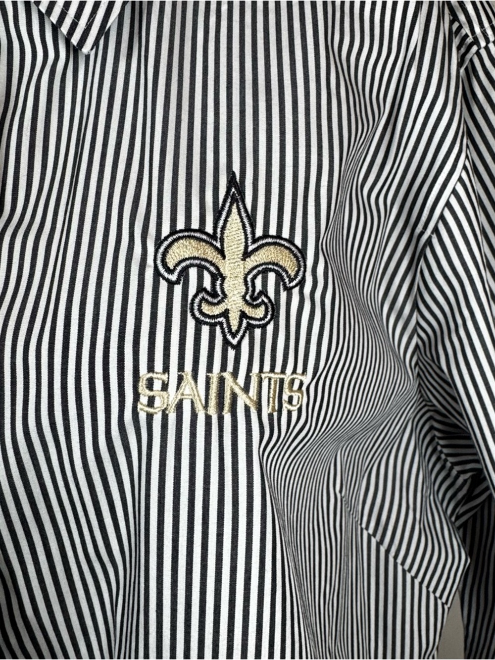 New Orleans SaintsCutter & Buck Black and White Striped Button-Down Shirt